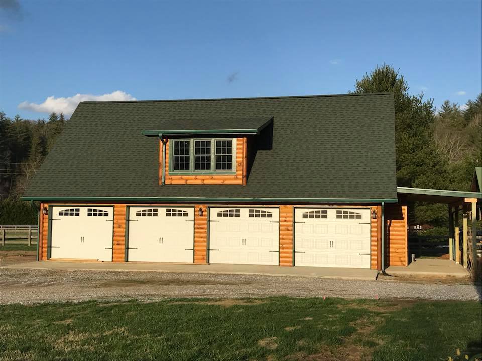 A custom four car garage built by Kevin Griffin Construction